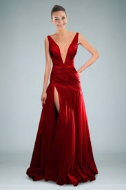 Voluptuous Pleated Evening Gown Featuring Plunging Neckline And Backless Design