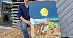 Photo Pontarlier. Steven Grah le crayon derrire l'affiche des Absinthiades