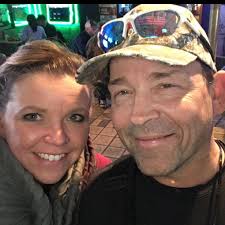 What type of wood is the vanity base likely made of?