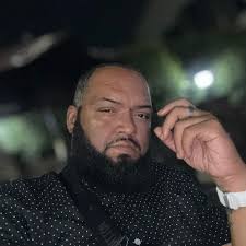 Pastor Bryan J. Pierce, Sr. singing "Listen".