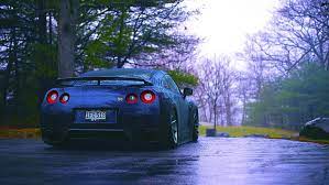 Hd Wallpaper Nissan R35 Gtr Blue Car Rear View Rain Trees Wallpaper Flare