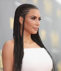 At the foot of the shoreline emerged a figure in a diving suit. Kim Kardashian West Responds To The Backlash Over Her Braids Glamour