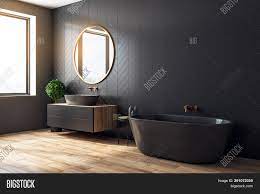 Bath room, ceiling lighting, enclosed shower, slate floor, and stone tile wall. Modern Black Bathroom Image Photo Free Trial Bigstock