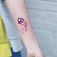 Beautifully Inked Pink Jelly Fish Tattoo On The Arm Www Otziapp Com Pink Tattoo Jellyfish Tattoo Tattoos