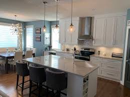 Our range of replacement doors and worktops in very comprehensive with over 30 different door styles and handles as well as some 25 variations of worktop surfaces to complement. Kitchen Cabinet Refacing Services In Calgary Custom Roll Out