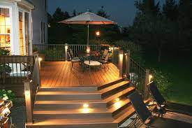 Cedar Deck Stain With Dark Gray Trim And Black Wrought Iron Furniture Outdoor Deck Lighting Deck Lighting Outdoor Deck Lighting Ideas
