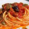Then pour the spaghetti, very al dente into the soffritto with a little cooking water, stir for a couple minutes. 1