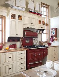 Stands feature faux marble countertops in grey and beige shades, wall classy antique style kitchen cabinets of wood in creams with beige undertones. The History Of Old Stoves Old House Journal Magazine
