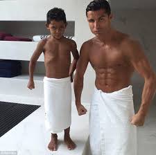 Shirtless Cristiano Ronaldo And Son Strike Matching Pose Ronaldo Junior Ronaldo Shirtless Cristiano Ronaldo