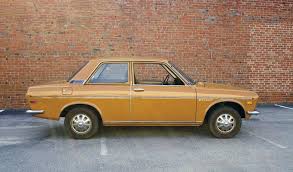 Image result for Gold Bronze 1959 Datsun