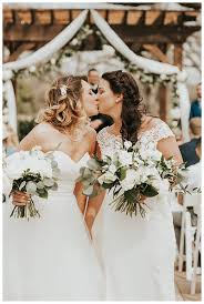 Two Brides Kissing Photo An Intimate Cliffside Destination Wedding In Beautiful Menorca Spain Lesbian Wedding Photography Lesbian Wedding Destination Wedding