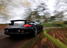 Your Ridiculously Cool Porsche Carrera Gt Wallpaper Is Here Porsche Carrera Porsche Carrera Gt Porsche Convertible