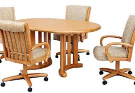 Choose your upholstery colors and metal or wood colors, select your caster chairs with or without arms and be prepared to and yes, these upholstered dining room chairs with casters also swivel! Dining Room Furniture And Sets