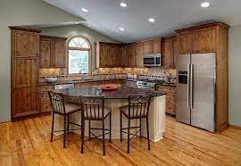 Triangle kitchen island with seating. L Shaped Rustic Kitchen With Triangle Island With Seating Traditional Kitchen Design L Shape Kitchen Layout L Shaped Kitchen Layout