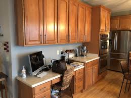 If you have oak or honey toned wood cabinets and want to refresh your kitchen, consider painting the walls in today's neutrals, such as soft i have honey oak kitchen cabinets, white appliances with sienna bordeaux countertops and marazzi trevi porcelain floors. What Color Should I Paint My Kitchen Cabinets Textbook Painting