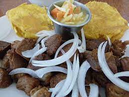 Griot Traditional Haitian Dish Made Of Fried Pork Chunks Yum Haiti Food Haitian Food Recipes Soul Food Caribbean Recipes
