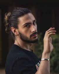 The man bun. 2015's very popular hairstyle for men.