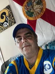 He played high school, and 1 year of Community College football before  leaving to join the service. After serving in the military he worked at an  aircraft factory. He decided to try