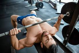 Keep your feet planted how to bench press with proper form. Weight Of Bench Press Bars The Standards And More