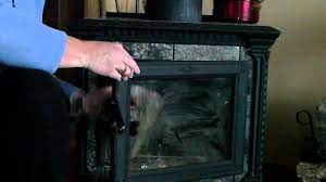 Remove streaks with water and vinegar. How To Clean Your Wood Stove Fireplace Glass Youtube