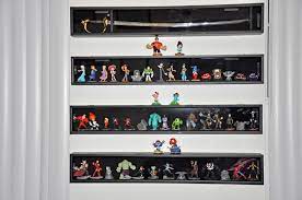 Baseball Bat Display Cases Bought At Michaels For 22 50 Normally 60 Holds 15 Characters In Case An Storage Organization Ideas Kid Toy Storage Big Boy Room