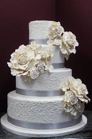 Your wedding cake will look stunning on a metallic silver cake stand. Wedding Cakes Alliance Bakery