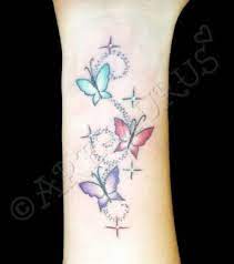 I Think I Want Something Like This With Dragonflies Instead Butterfly Tattoo Designs Tattoos For Kids Tattoos