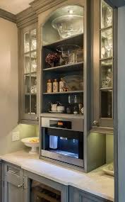 The cupboard is certain to hold all of the essentials you'll need to brew the perfect cup of java. 28 Coffee Station Ideas Built Into Your Kitchen Cabinets Decor Snob Built In Coffee Maker Kitchen Bar Design Outdoor Kitchen Appliances