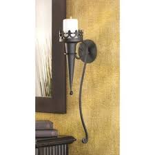 Shop wall lights and sconces and other antique, modern and contemporary lamps and lighting from top sellers and makers around the world. Medieval Candle Sconce Overstock 23015784