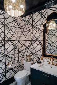 Black And White Powder Room Wallpaper Black And White Powder Room With Bold Graphic Wallpaper By Michele Plachter Design Powder Room Decor Powder Room Design Powder Room Wallpaper