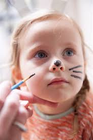 Using a thin brush with black paint, add little strokes around the white eyebrows to give them texture. Rabbit Face Paint Shefalitayal