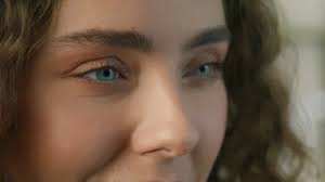 Slow motion smiling light blue eyes, Goo...