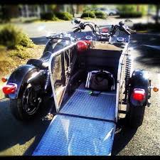 A Guy In A Wheelchair Was Driving This Motorcycle Wheelchairs Design Trike Motorcycle Motorcycle Sidecar