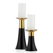 Wipe clean with a dry cloth. Urbane Black And Gold Pillar Holder