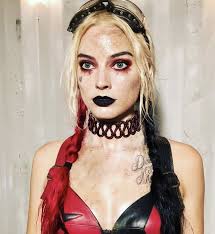 This is her best live action costume it's the perfect mix of classic Harley  with a modern take kudos to James Gunn and the injustice 2 dev for coming  with this outfit :