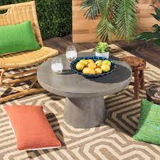 Outdoor entertaining at its best, the catalina round coffee table is a perfect addition to the ultimate patio destination. Safavieh Delfia Outdoor Modern Concrete Round Coffee Table Dark Grey Walmart Com Walmart Com