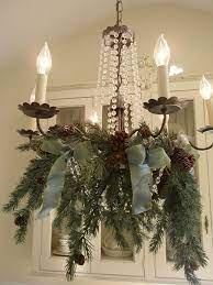 Easy Christmas Decor Ideas Pretty For A Dining Room Chandelier Christmas Chandelier Rustic Christmas Christmas Decorations