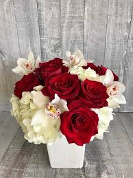 We specialise in beautiful flowers delivered in studio city for any occasion. Red Roses And Orchids By Diana S Flowers