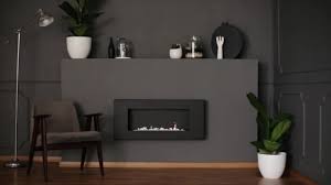 Use a lighter, warmer grey when painting the walls and layer darker saturations with a painted fireplace surround and statement furniture pieces. Video Dark Grey Living Room Interior Fresh Plants Decor Retro Video By C Photographee Eu Stock Footage 210880504