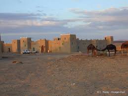 Take a look through our photo library, read reviews from real guests and book now with our price guarantee. Kasbah Tombouctou The Housing Part In The Early Morning Merzouga Morocco