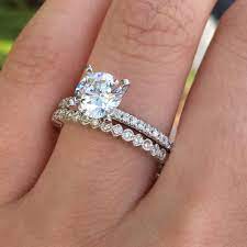 Solitaire Vs Halo Engagement Ring Comparison Raymond Lee Jewelers 14k White Gold Engagement Rings Womens Engagement Rings Leaf Engagement Ring