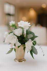 Winter wedding centerpieces ideas,winter wonderland wedding centerpieces,white wedding flower. Elegant Cocktail Table Arrangement Of White Spray Roses Eucalyptus Greenery In A Small Cocktail Table Centerpieces White Spray Roses Rose Centerpieces Wedding