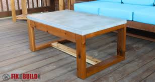 A beautiful wooden plank tops the pine bass. Diy Concrete Top Outdoor Coffee Table Fixthisbuildthat