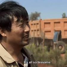 smokes cigarette like face hurts ::