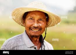 Chinese farmer happy hi-res stock photography and images