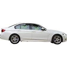 A White Car Parked In Front Of A Green Lawn Most Of The Rest Of The Background Has Been Tightly Cropped For Your Project Use Car Side View White Car Car