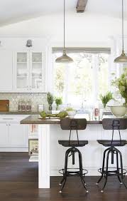 white kitchen cabinets with cream