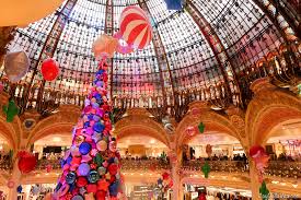 Whether or not you plan to shop, the galeries lafayette paris haussmann department store is a sight to be seen. Christmas Tree At Galeries Lafayette In Paris And Christmas Decorations