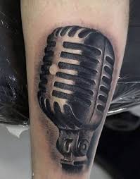 Get daily tattoo ideas on socials. Simple Designed Black Ink Vintage Microphone Tattoo On Arm Tattooimages Biz