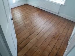 This Pine Floor Was Sanded Gap Filled Using Reclaimed Pine Slithers Then Stained And Finished With A Matte Lacq Wood Floors Wide Plank Wood Floors Pine Floors